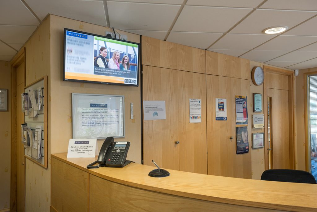 Digital signage welcome screen in a reception area